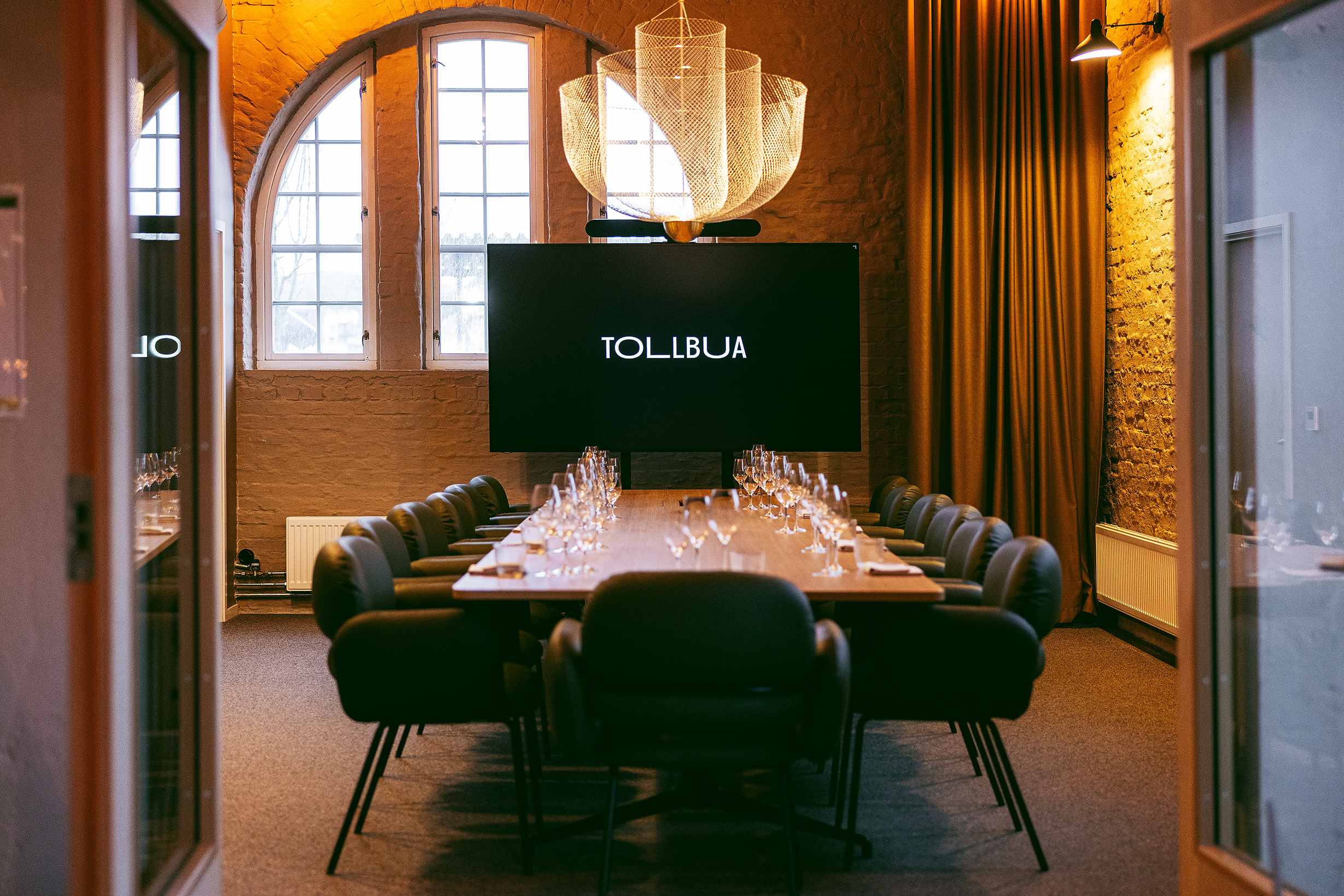 Tollbua's Chandelier Room is an exclusive private space, with windows on two sides and luxurious armchairs for up to 14 people.