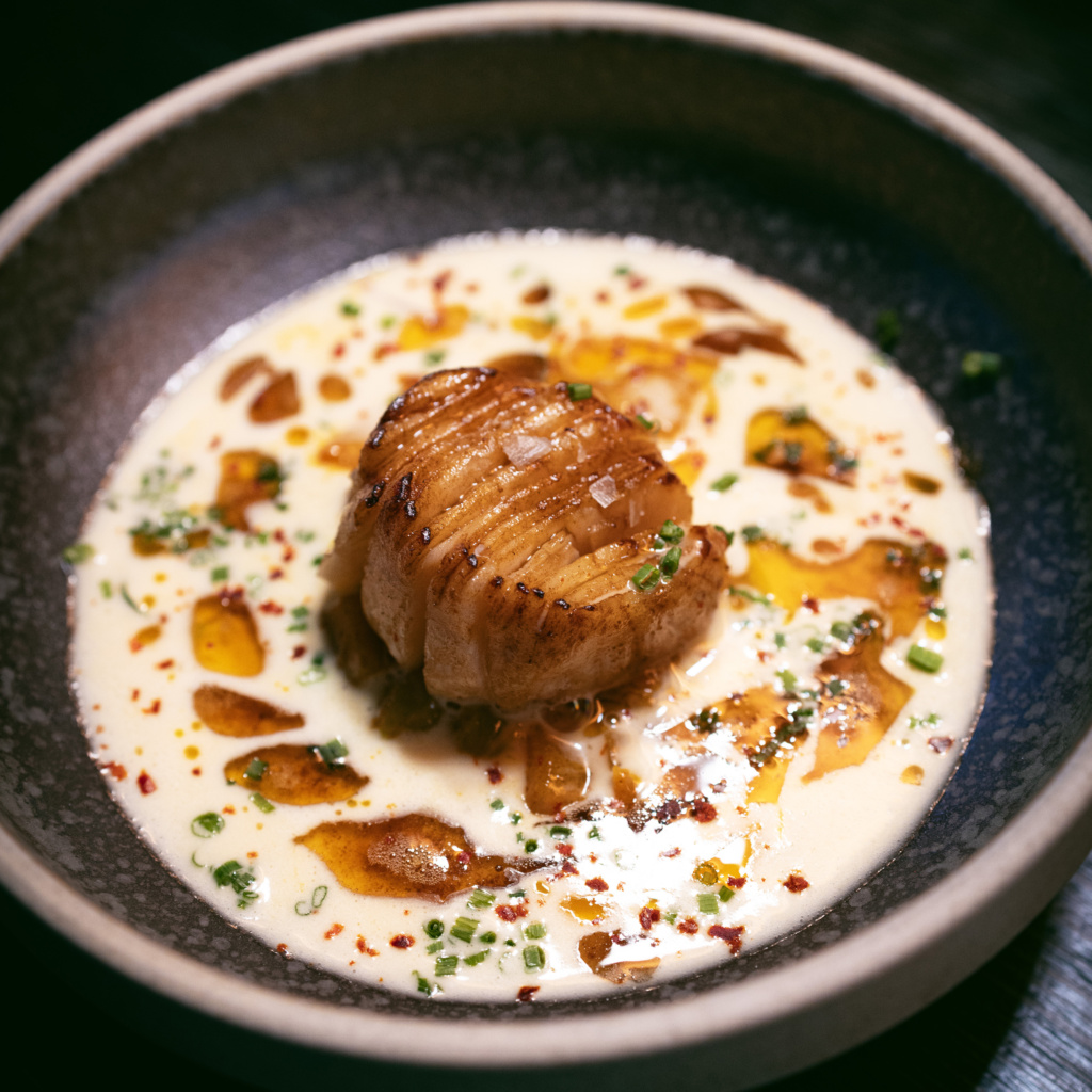 The signature scallop dish at Tollbua